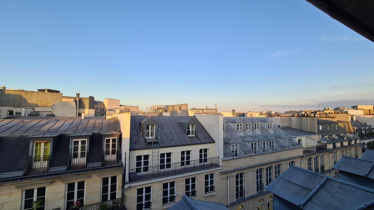 Appartement Coeur De Paris Avec Vue Sur Les Toits מראה חיצוני תמונה